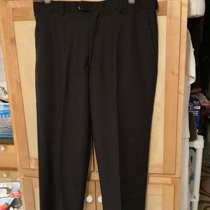 New pair of mens dress pants. Black  pants still has tags.